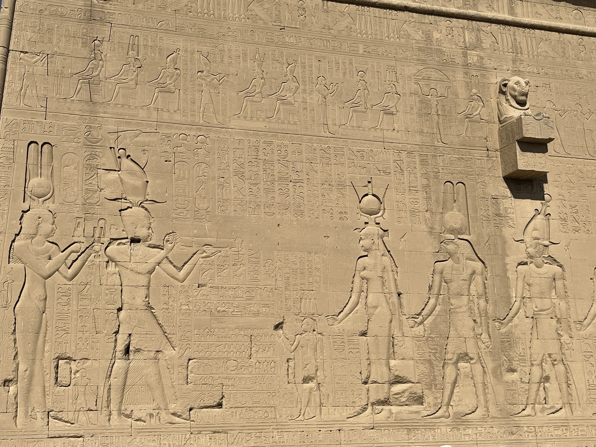 Back wall of Denderah Temple showing Cleopatra VII (far left) behind small Caesarean who is behind larger "ka" of Caesarean