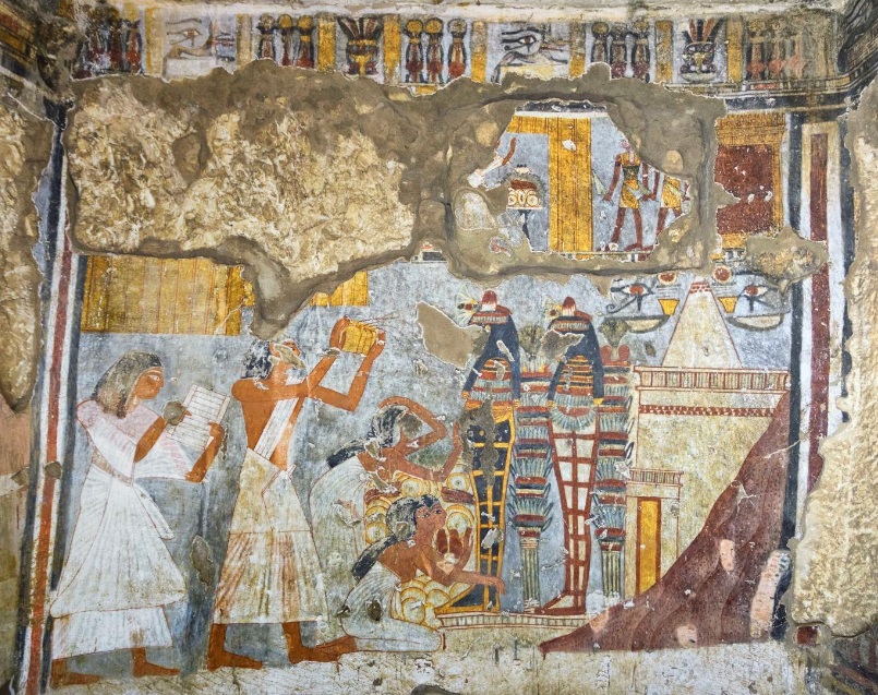 Detail of the west wall showing the deceased, Raya and his wife Mutemwia, in front of the tomb prior to internment